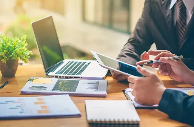 Business people analyzing and planning