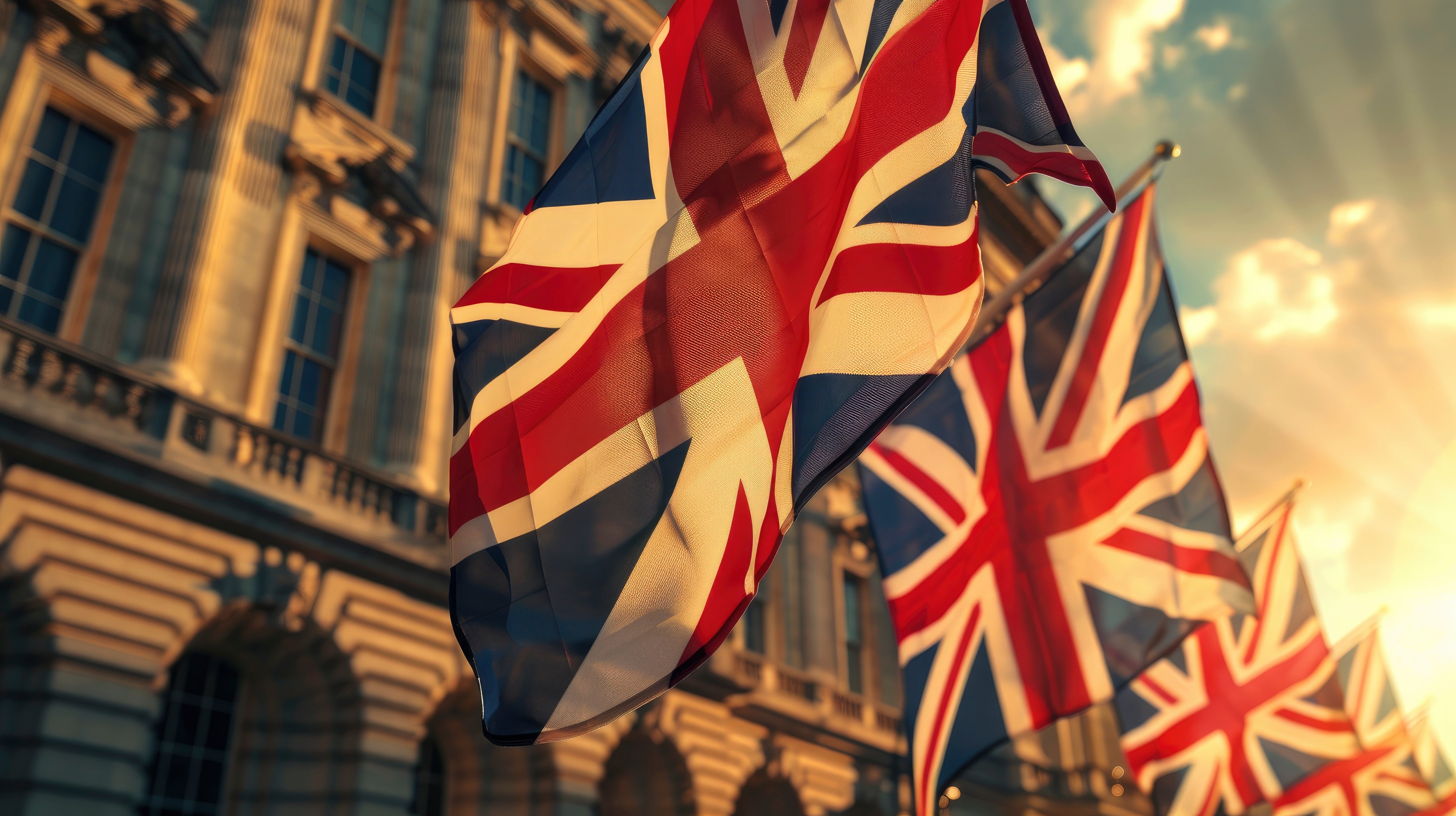 UK flags flying in front of parliament building